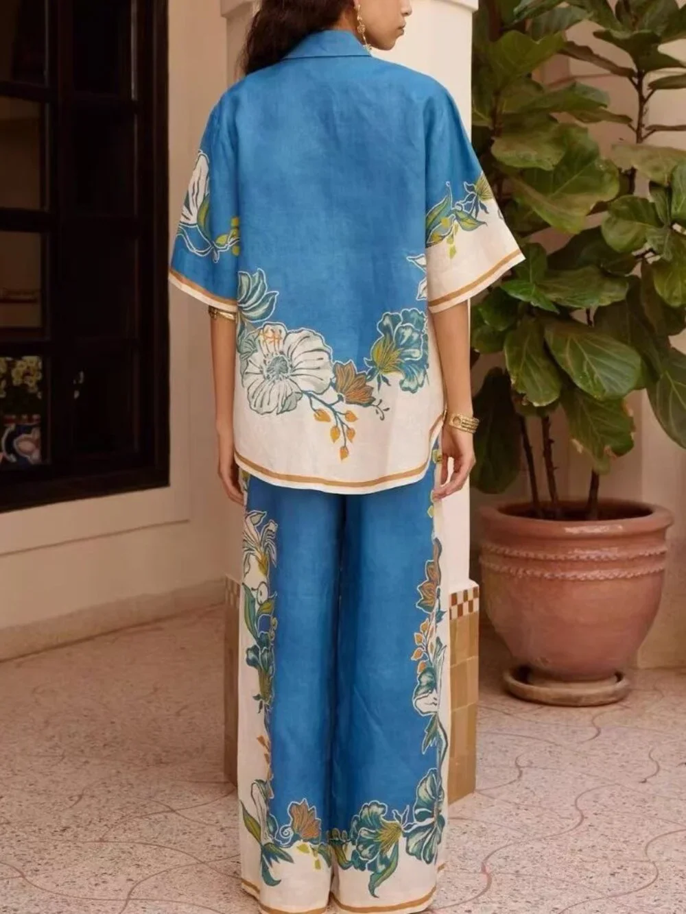 Zimmermann Blue and white shirt two-piece set.